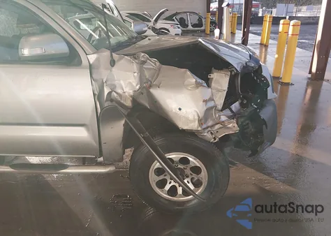 2015 Toyota Tacoma Base V6 z USA, uszkodzony, nr VIN 5TFLU4EN9FX121641